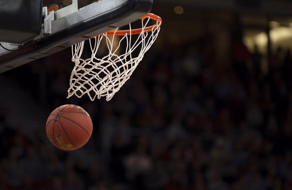Basketball arena with dramatic lighting
